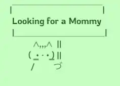 Cat holding sign that reads: Looking for a Mommy